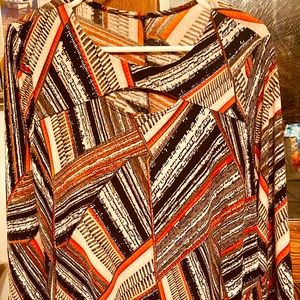 Women’s 1X knee length Print Dress with side pockets.